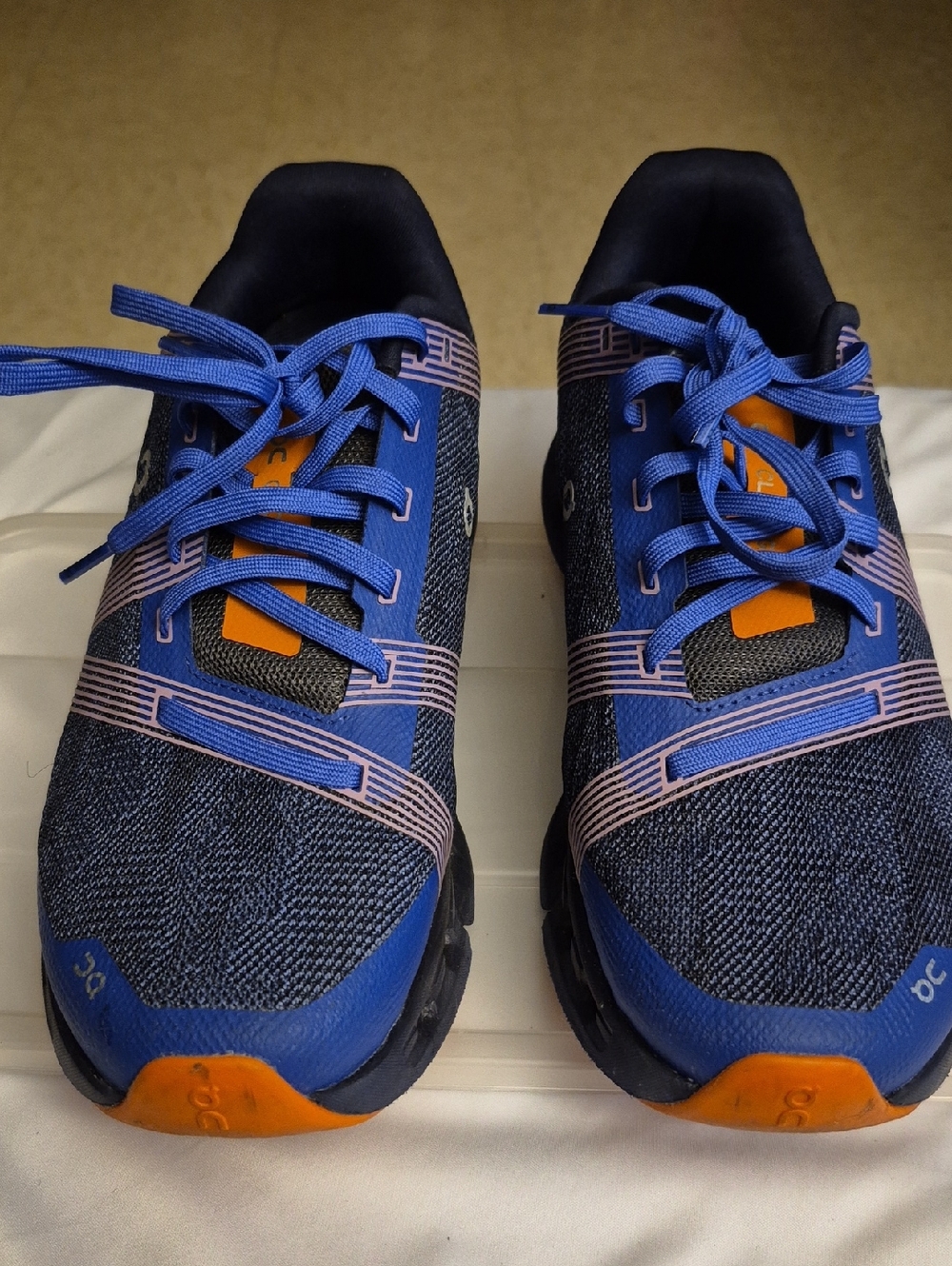 On Running Blue and Orange Cloudgo Running Shoe